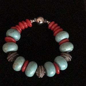 Turquoise/red coral and silver bracelet.